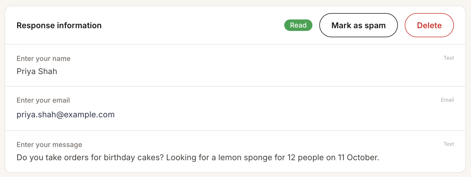 A message in Hi Widget with the Mark as spam button next to Delete